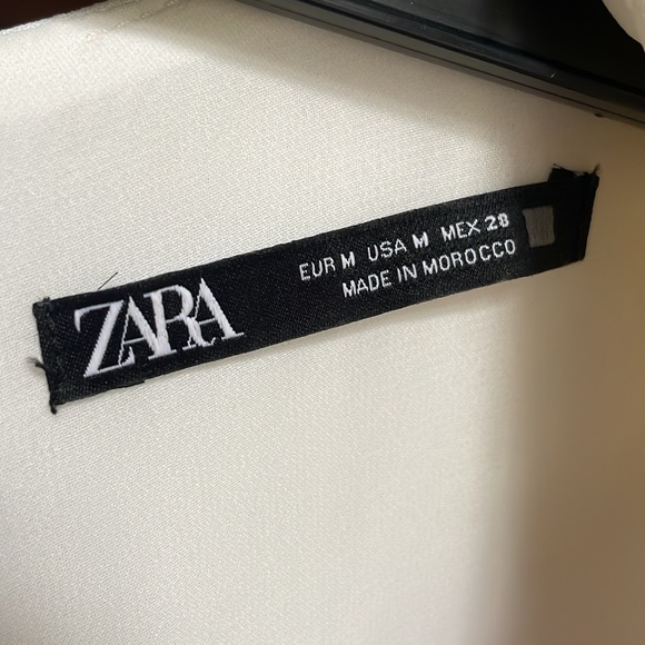 Elegant White Jumpsuit with Belt - Picture 3 of 10